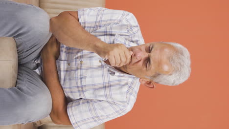 Vertical-video-of-Man-with-nausea.